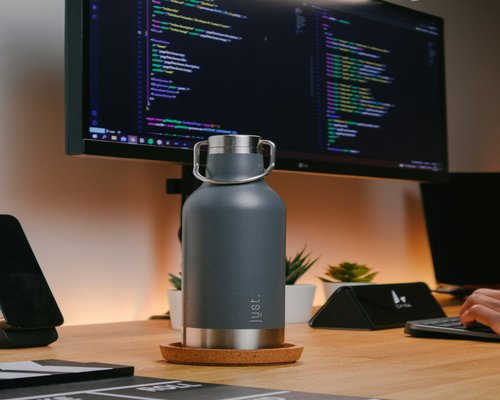 Water bottle on a work desk setup